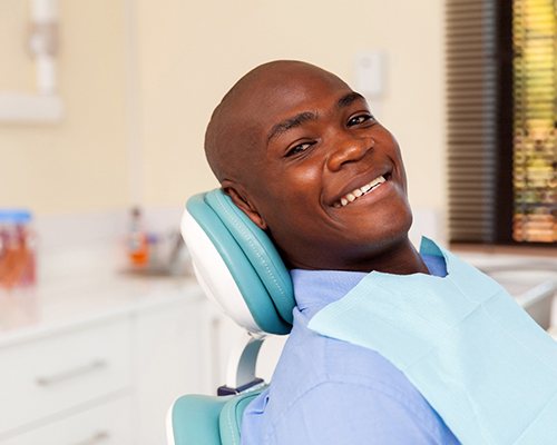 Man with dental bridge in Center visits Center dentist