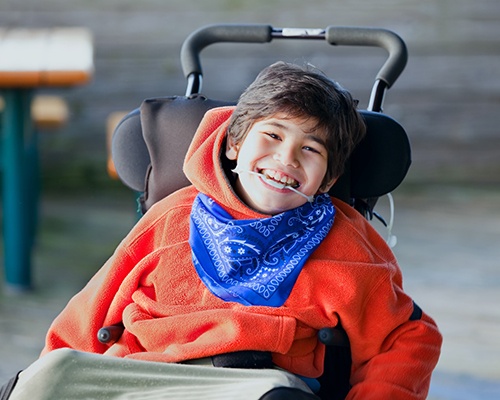 Boy in a wheelchair in Center
