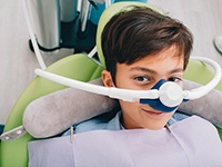 a child receiving nitrous oxide sedation at the dental office