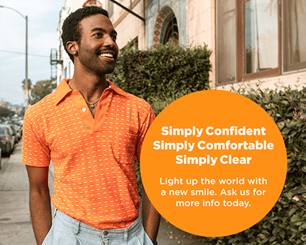 SimplyClear branded image of confident man walking outdoors